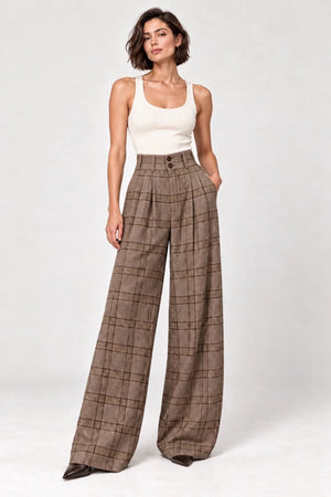 Full-length front view of Hope brown check wide-leg trousers styled with an ivory sleeveless top.