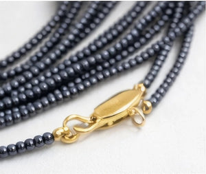 Leather necklace featuring zamak metal and rhodium plating in gold, rose gold, and silver. - ELLY