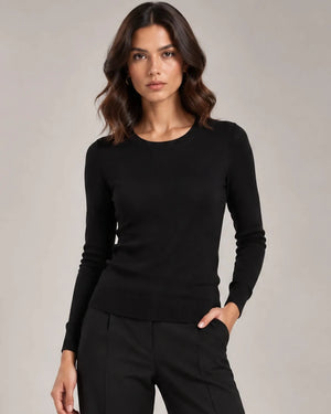 Front view of the black Livia crew-neck knit top with long sleeves and ribbed trims.