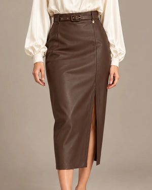 Close-up front view of the brown belted leather-look midi skirt, showing the buckle, star charm and front slit.