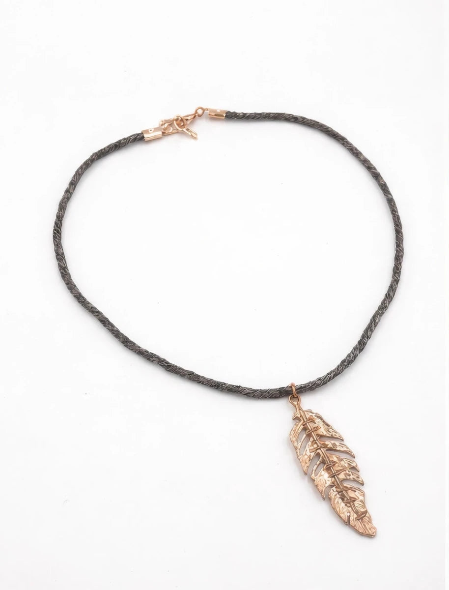 Rhodium coated brass pendant on a metallic string - ELLY