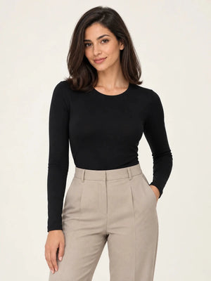 Black stretch-cotton crew-neck long-sleeve top styled with stone tailored trousers, front view