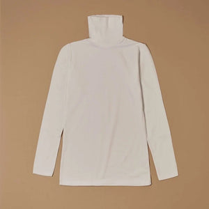 White stretch-cotton turtleneck long-sleeve top laid flat, front view