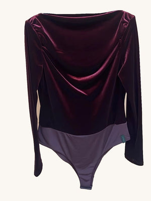 Full front view of the Vela velvet draped-neck bodysuit in Bordeaux, showing long sleeves and a smooth brief-style lower section.