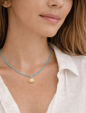 18 karat gold plated necklace featuring beads and a striking Japanese pearl pendant - ELLY