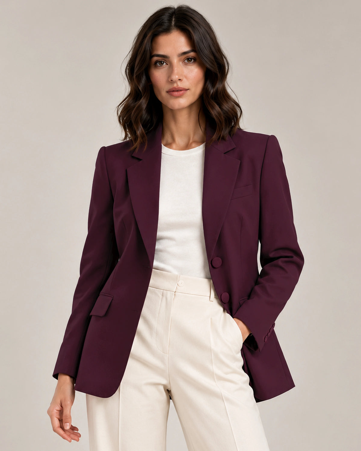 Close-up of the Adelaide Bordeaux tailored blazer showing notched lapels, covered front buttons and flap pockets.
