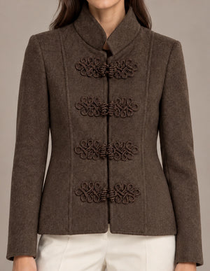Close-up of the brown Allegra Moro Toggle Jacket showing the stand collar and decorative frog closures.
