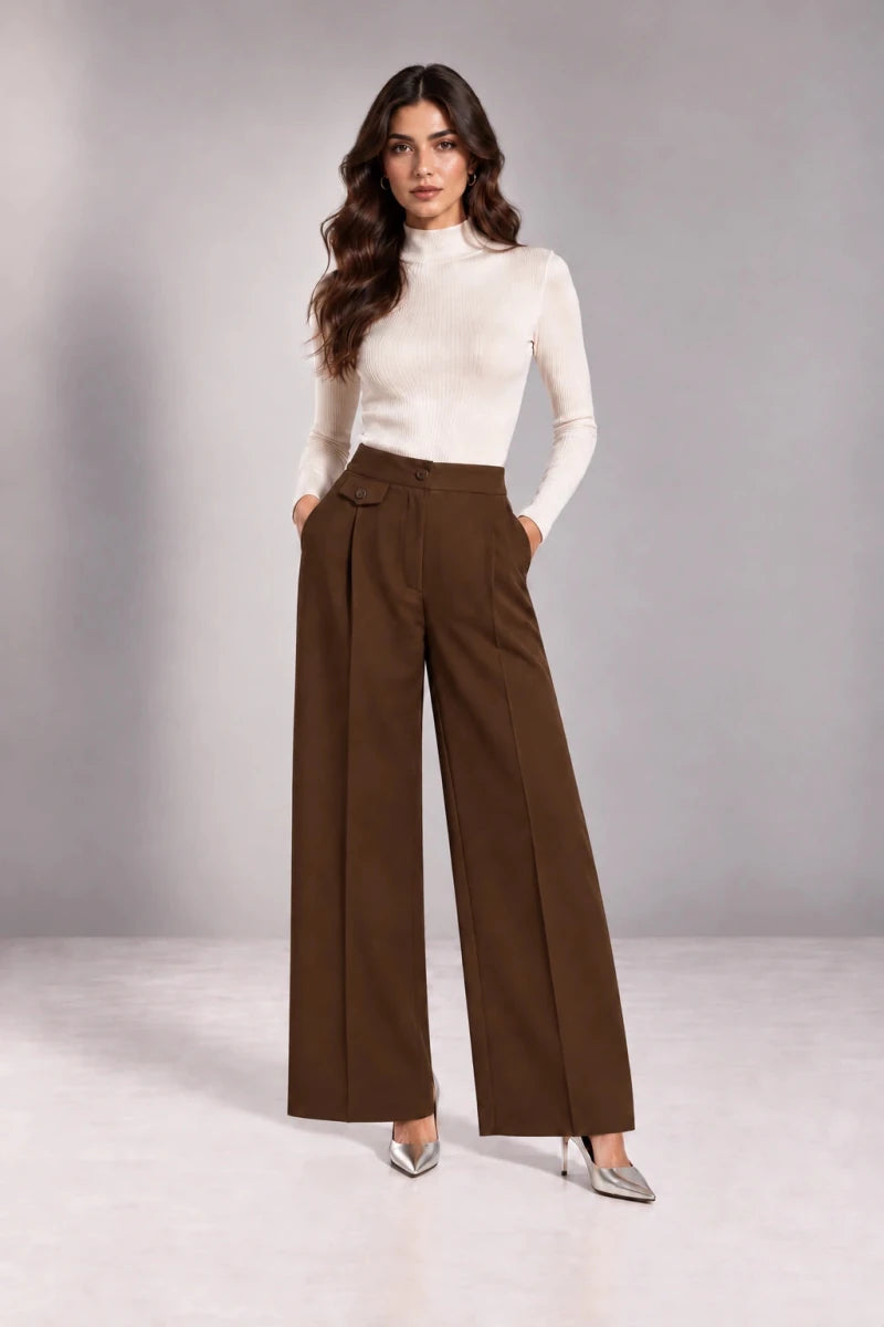 Full-length front view of brown Arianna Tabacco trousers with very wide legs and front pleats, styled with an ivory top.