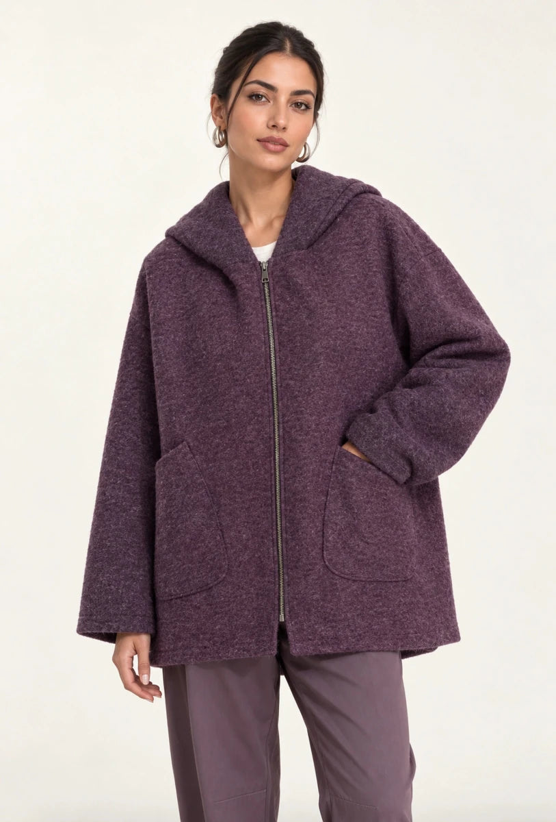 Front view of Cappotto Oversize Unica Uva purple hooded coat showing the zip closure and large patch pockets
