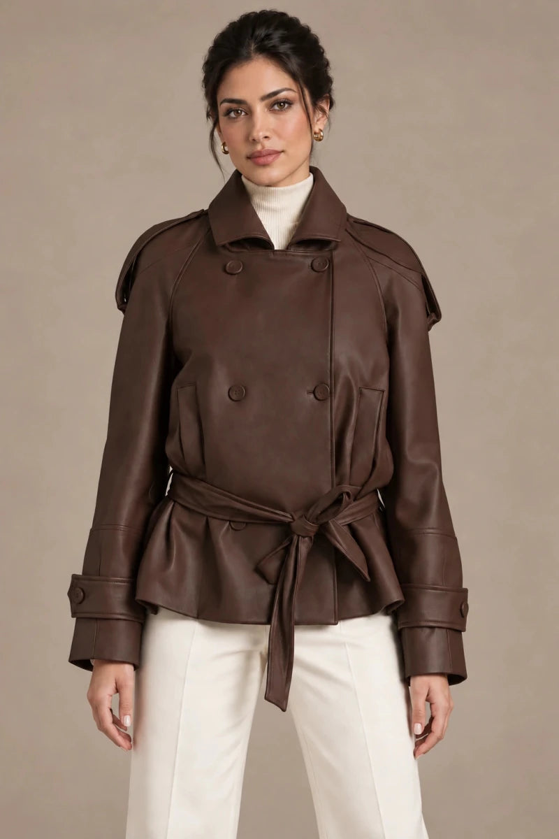 Front view of the brown Clara Moro jacket worn belted over an ivory top and trousers.