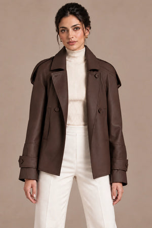 Front view of the brown Clara Moro jacket worn open over an ivory top and trousers.