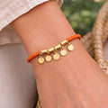 Coral Orange Beaded Bracelet with 18 Karat Gold - Plated Coin Charms - ELLY