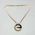 ELLY Necklace - 18 Karat Gold Plated Brass with ELLY Ornament Pendant