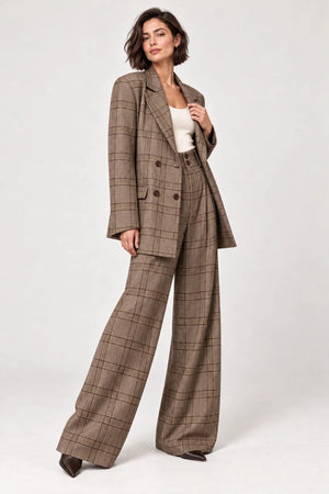 Rosalinda brown check blazer and matching Hope wide-leg trousers shown in a three-quarter view, styled with an ivory sleeveless top.