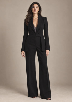 Iole Black Sculpted Blazer – Nero in Nero, full-length view on model showing the upper garment silhouette