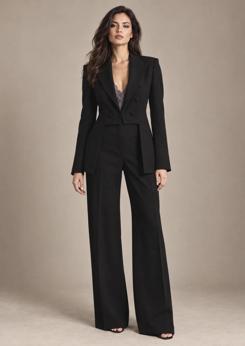 Iole Black Sculpted Blazer – Nero in Nero, full-length view on model showing the upper garment silhouette