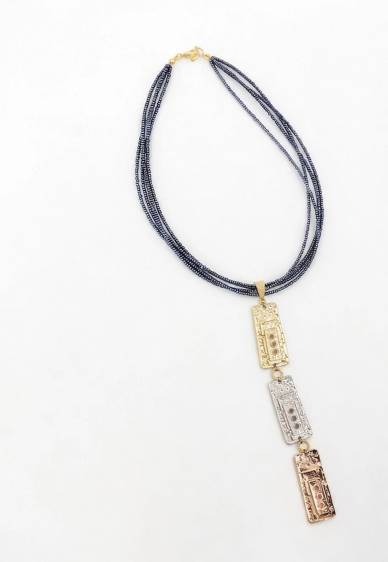 Leather necklace featuring zamak metal and rhodium plating in gold, rose gold, and silver. - ELLY