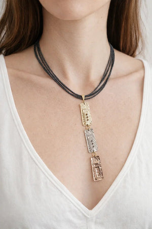 Leather necklace featuring zamak metal and rhodium plating in gold, rose gold, and silver. - ELLY