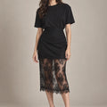 Letizia Black Lace Midi Skirt – Nero in Nero, full-length view on model emphasizing the skirt