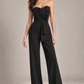 Mabel Black Strapless Jumpsuit – Nero in Nero, full-length model view showing the strapless bodice and wide-leg silhouette