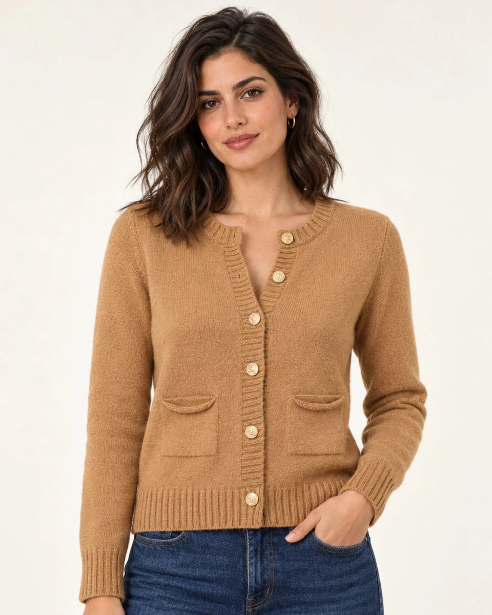 Close-up of Mariana Beige knit cardigan with gold-tone buttons, front patch pockets and ribbed edges
