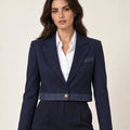 Moana navy pinstripe cropped jacket with a chest pocket and contrast hem, worn over a white top