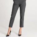 Close-up of ELLY Pantaloni Gessati Grigio: grey pinstripe trousers with front pleats and tapered ankle-length legs.