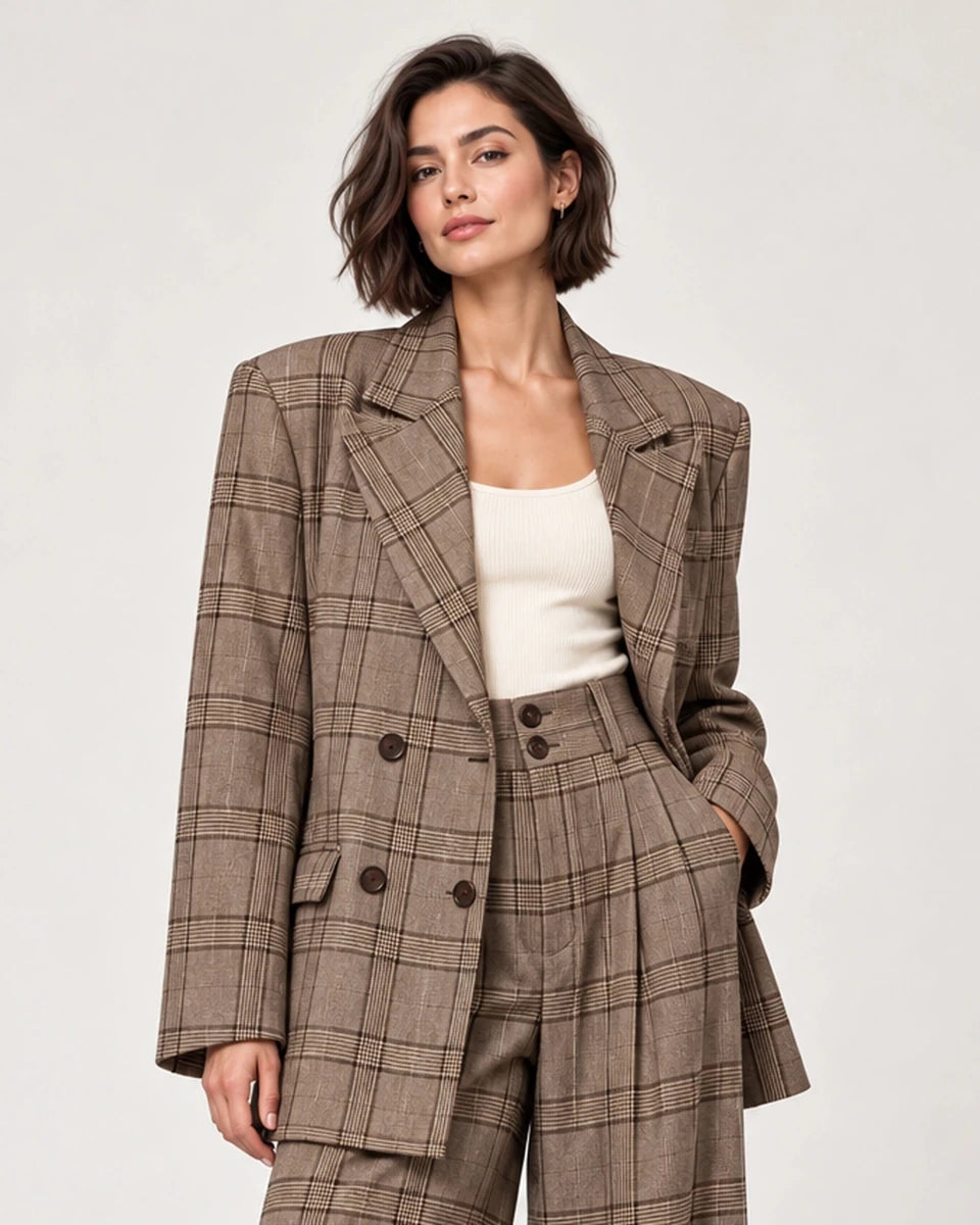 Close-up of the Rosalinda brown check double-breasted blazer showing notched lapels and front buttons.