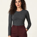 Dark mélange grey stretch-blend crew-neck long-sleeve top styled with burgundy trousers, front view