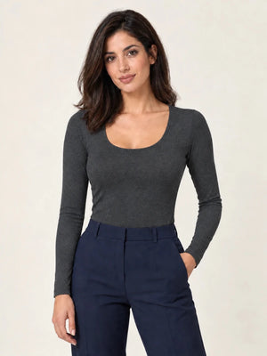 Dark mélange grey stretch-blend deep scoop-neck long-sleeve top styled with navy trousers, front view