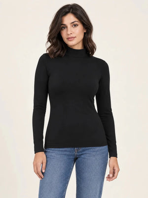 Black stretch-cotton mock-neck long-sleeve top worn untucked with blue jeans, front view