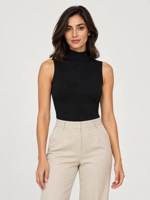 Black stretch-cotton sleeveless mock-neck top styled with stone trousers, front view