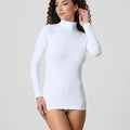 White stretch-cotton turtleneck long-sleeve top, fitted front view