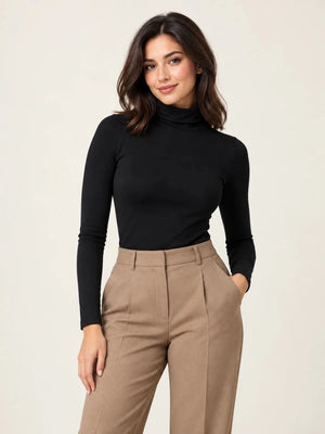 Black stretch-cotton turtleneck long-sleeve top styled with camel trousers, front view