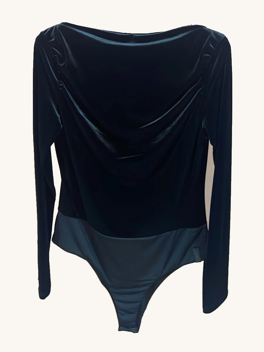 Full front view of the Vela velvet draped-neck bodysuit in Nero, showing long sleeves and a smooth brief-style lower section.