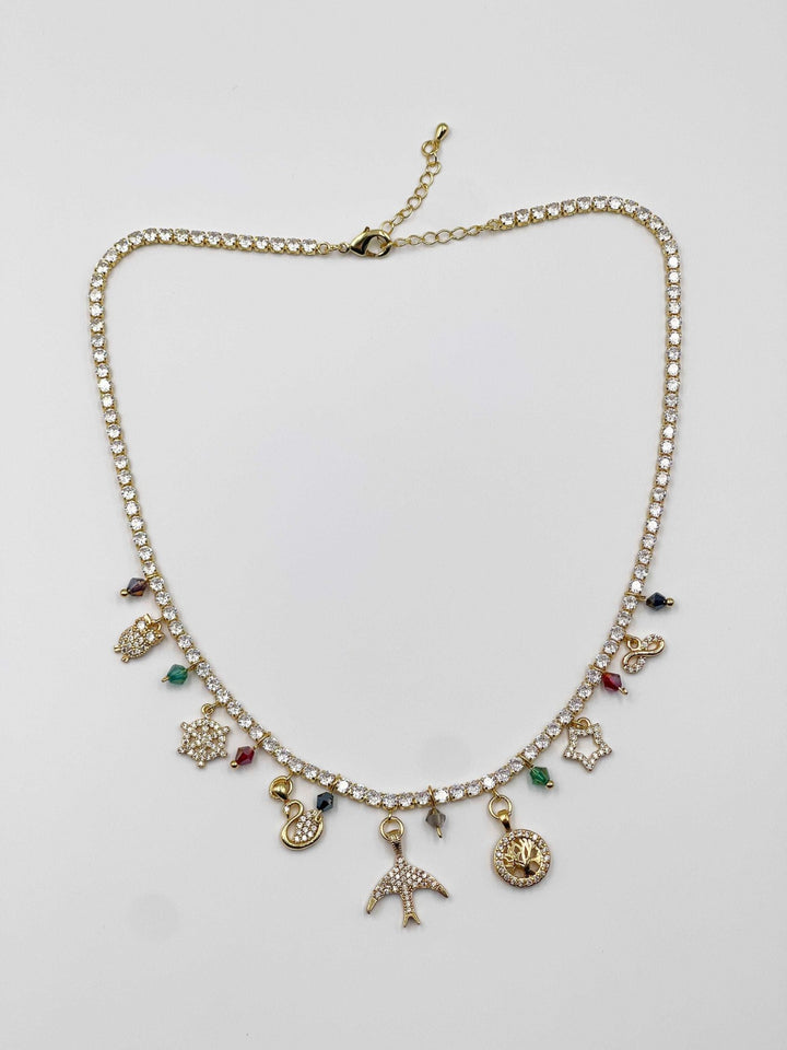 18-karat gold-plated necklace adorned with sparkling crystal and zircon ornaments, as well as colored crystal stones - ELLY