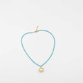 18 karat gold plated necklace featuring beads and a striking Japanese pearl pendant - ELLY