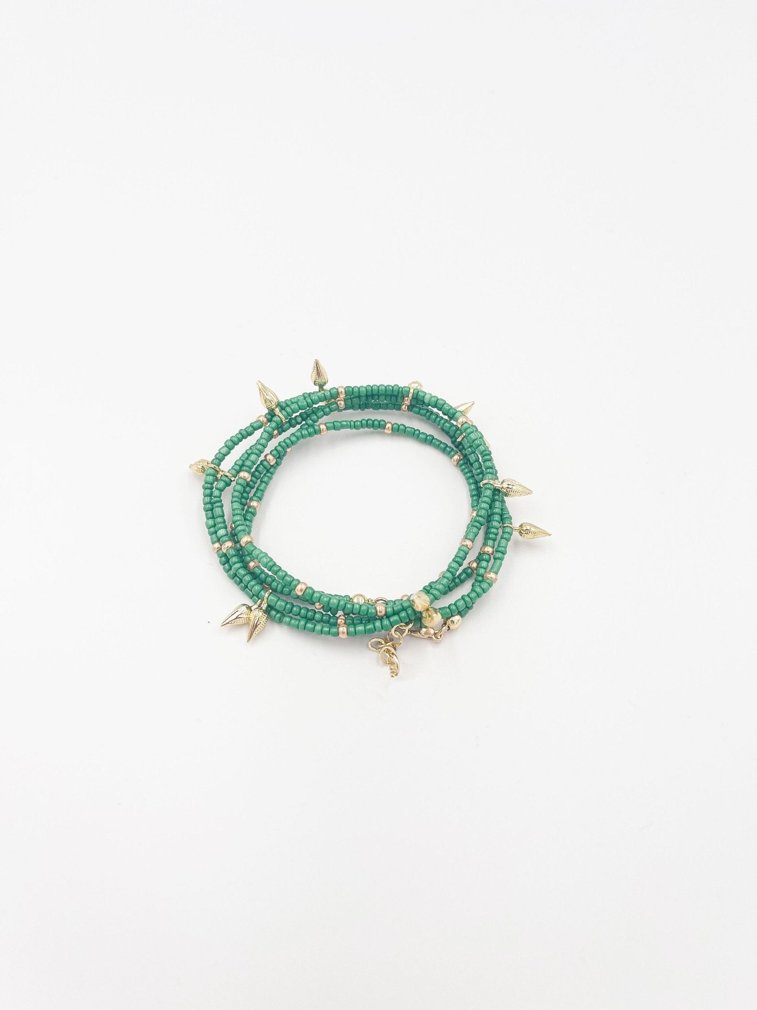 Beads necklace featuring 18 karat gold plated ornaments that can be styled as a bracelet or belt. - ELLY