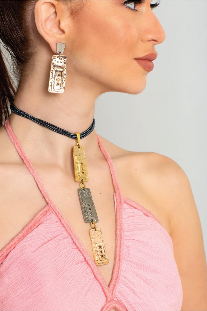 Leather necklace featuring zamak metal and rhodium plating in gold, rose gold, and silver. - ELLY